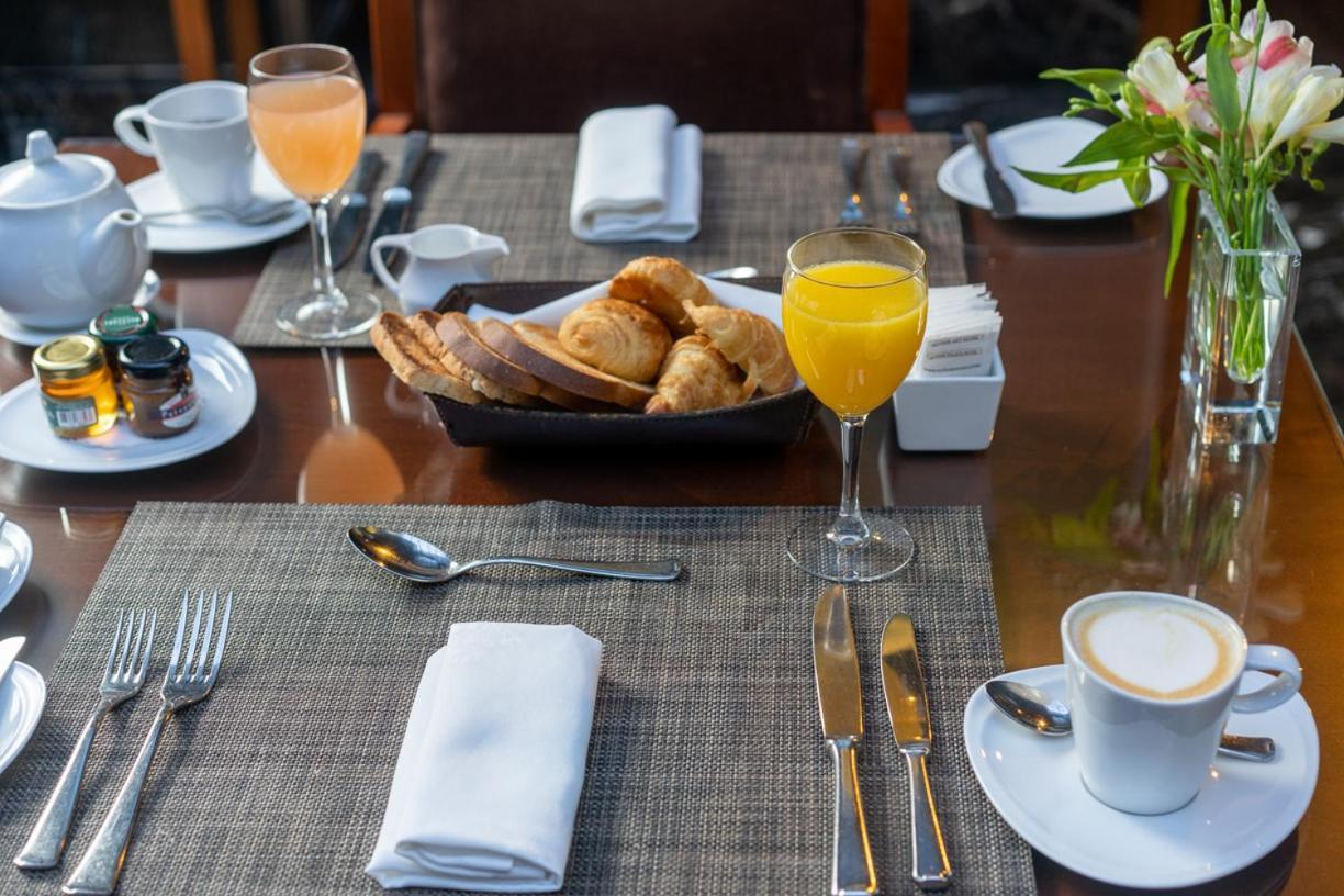 Alvear Art Hotel Buenos Aires Exterior photo A table set for breakfast